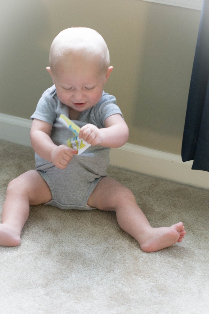 This was my attempt to finally get his 12month pictures with the sticker for his photo collage. It didn't happen. This was the only shot I got. I still have the sticker, but I will obviously have to do this with Mark at home.