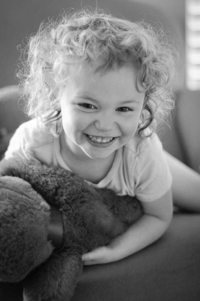 Emma playing with the dog that my sister Colleen gave me one year for Christmas