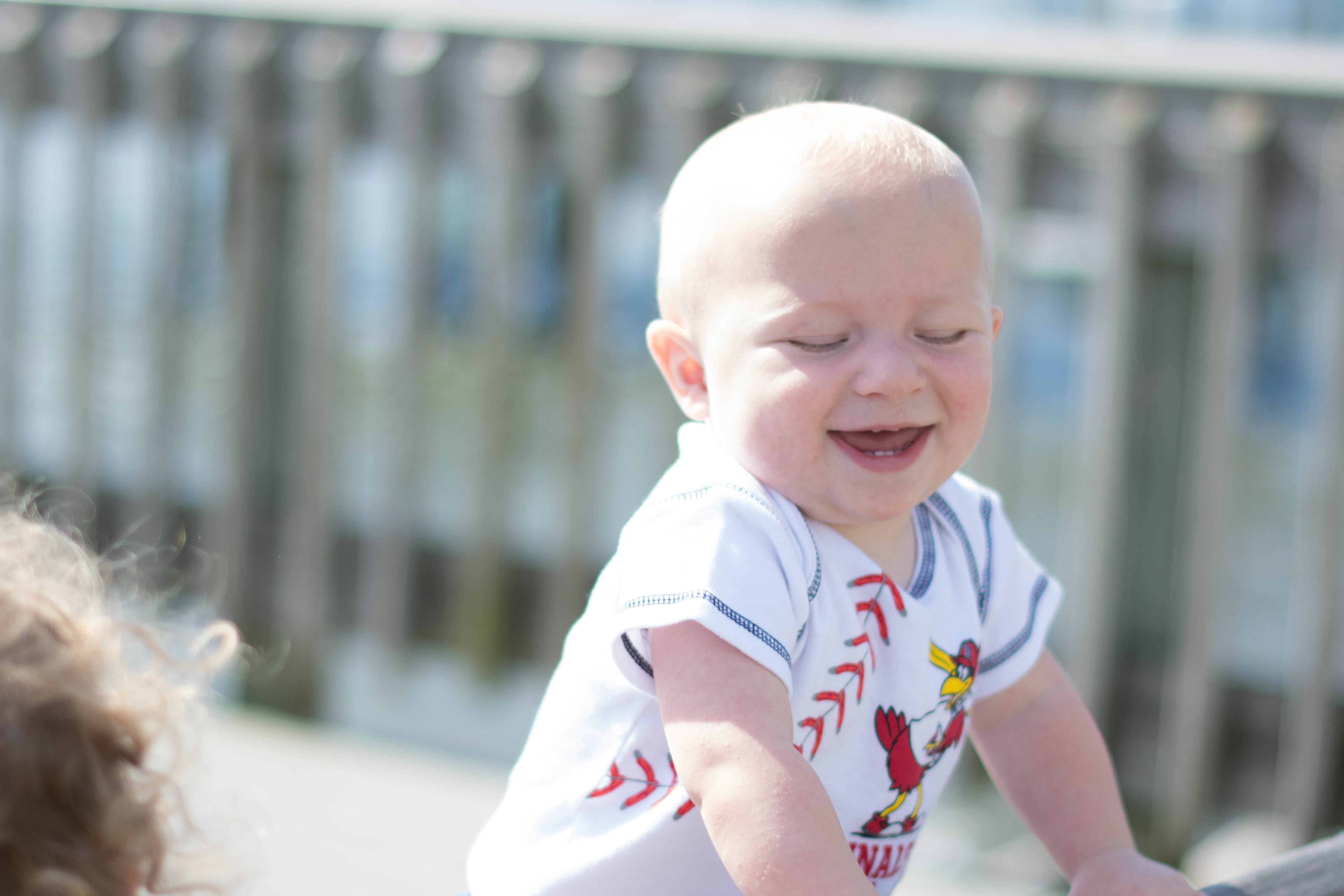 He is so happy! This time it was because he got out of the stroller. He needs to learn to walk. :)